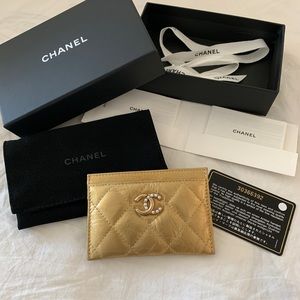 Chanel crinkled calfskin gold card holder with pearl accent logo